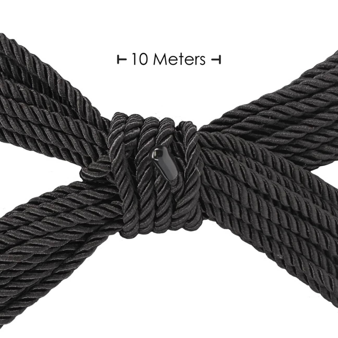 Close-up of Ouch! black bondage rope showing smooth polyester fibre texture